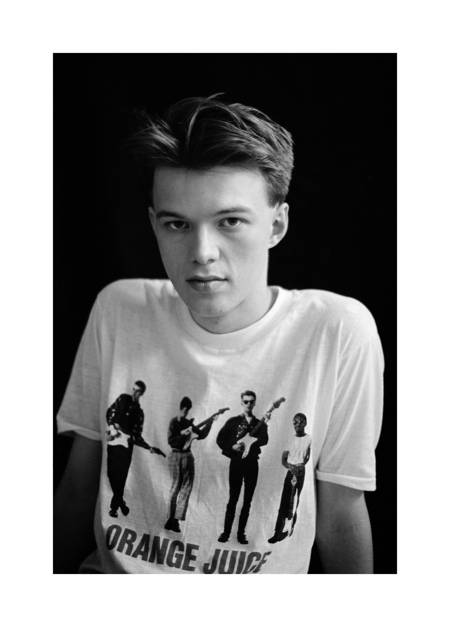 Image of Edwyn Collins (with OJ t-shirt) by Harry Papadopoulos