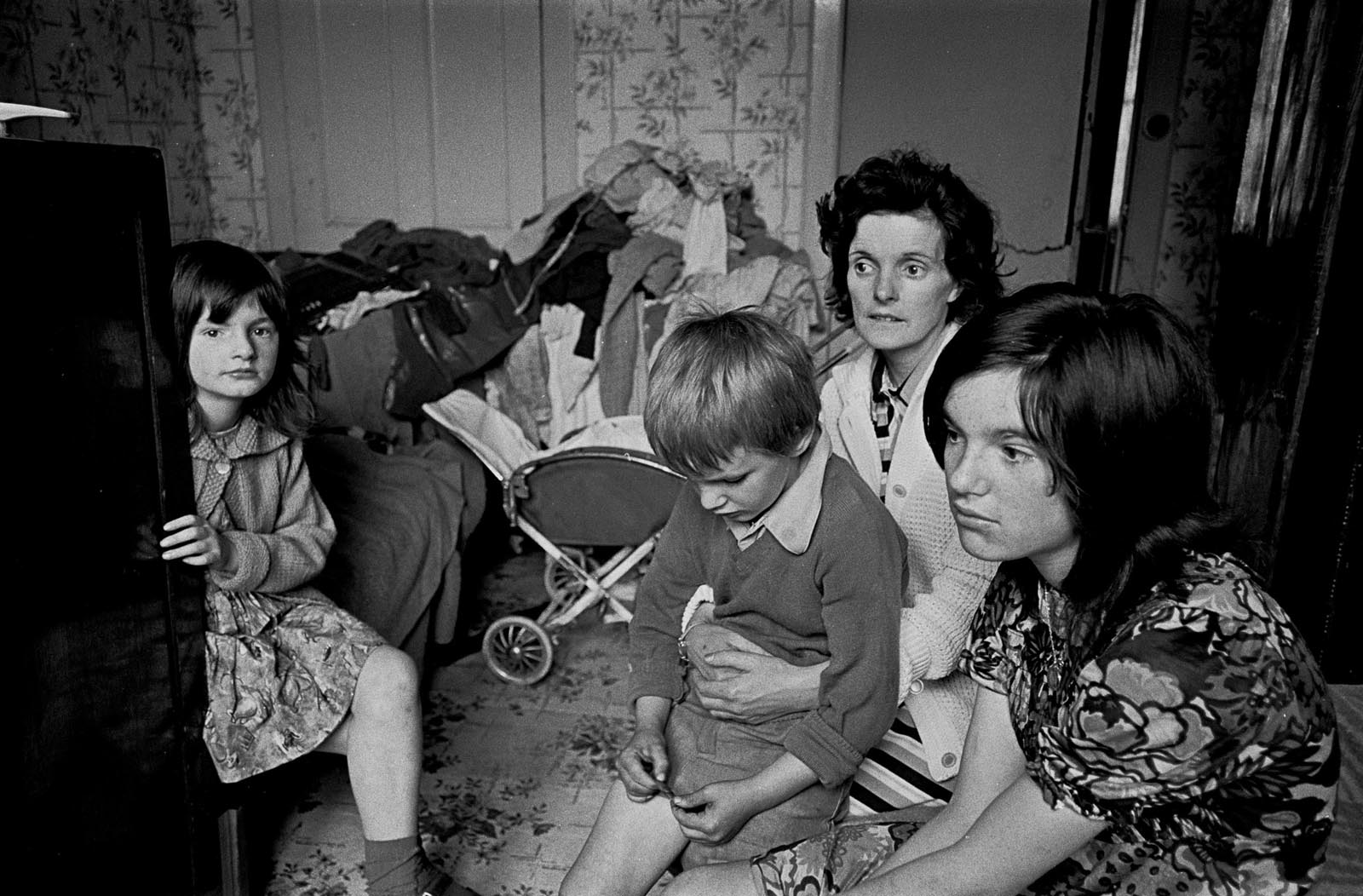 Family living in an overcrowded tenement flat. Glasgow, 1971